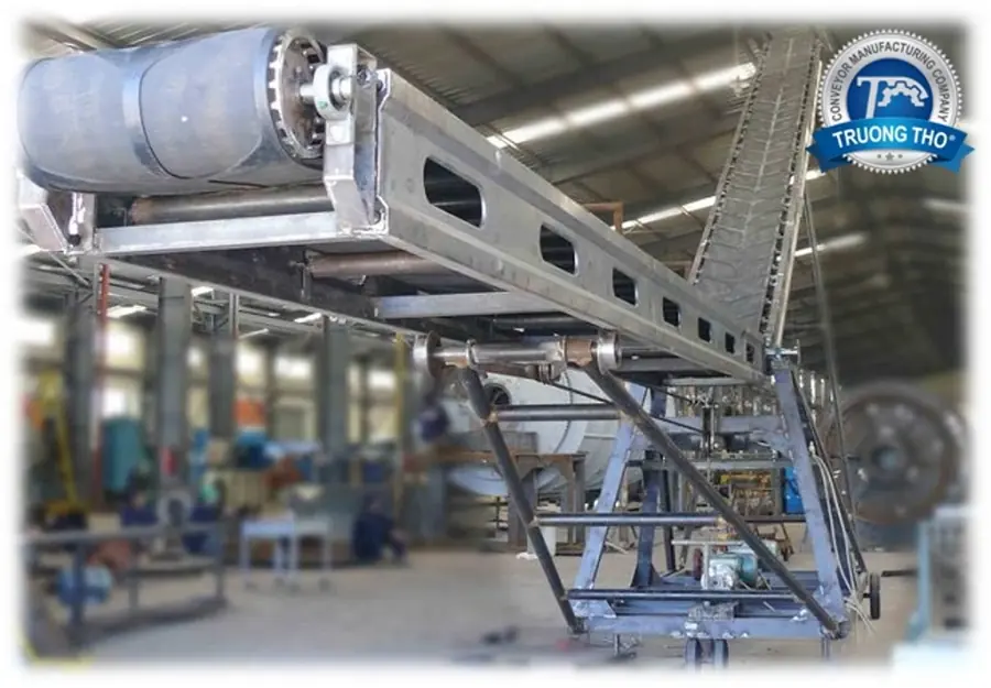 băng tải cánh bướm nâng hạ 