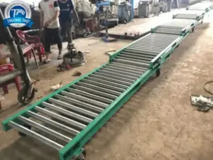 Băng tải con lăn kéo giãn