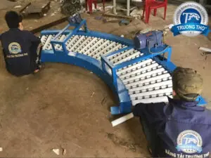 băng chuyền con lăn góc cong - ảnh 2