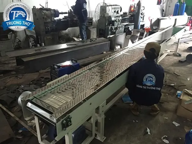 băng tải xích tấm inox