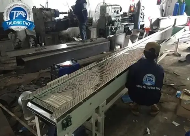 băng tải xích tấm inox