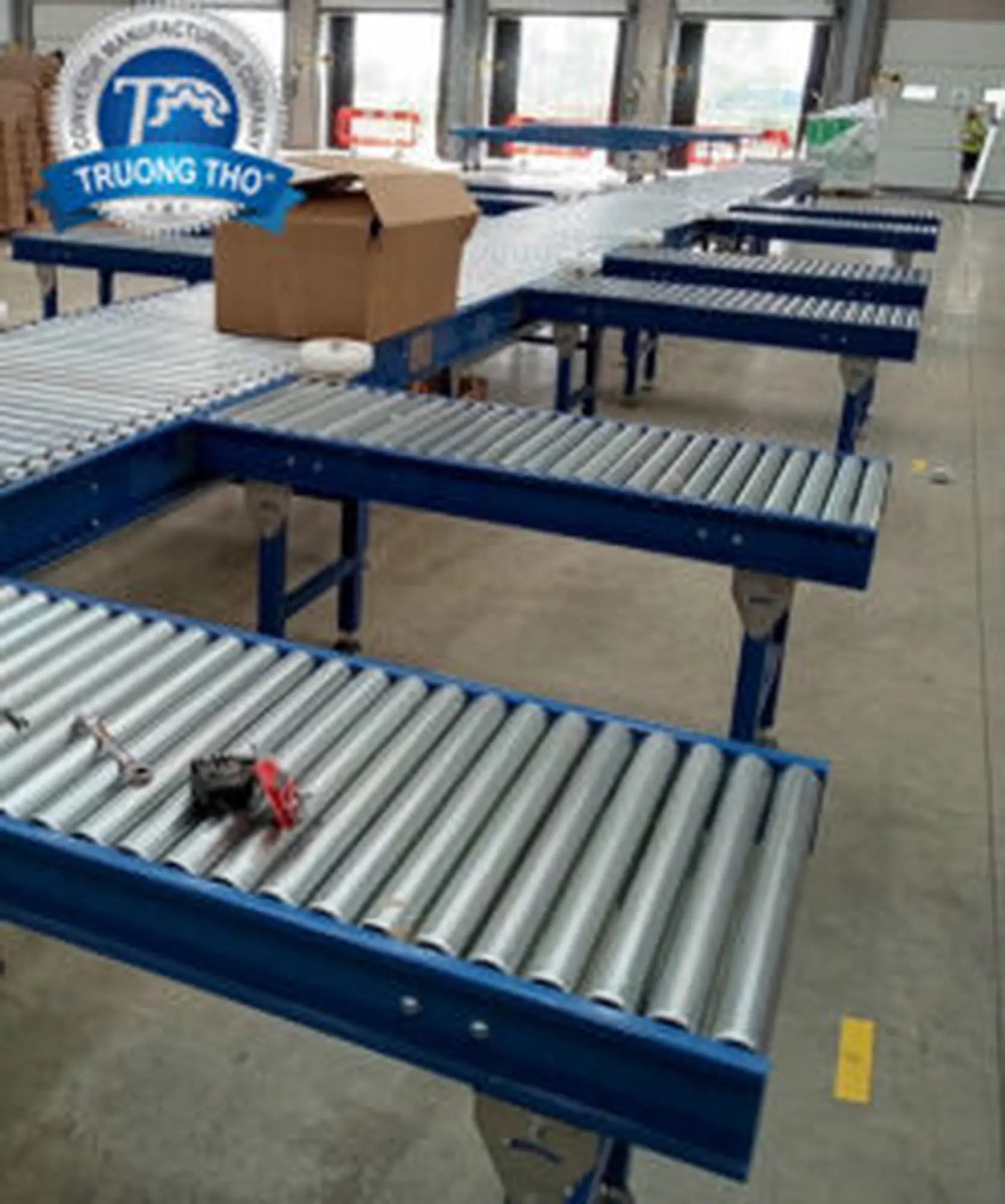 Băng tải con lăn phân chia loại