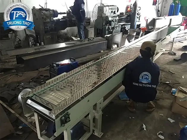 băng chuyền xích tấm inox